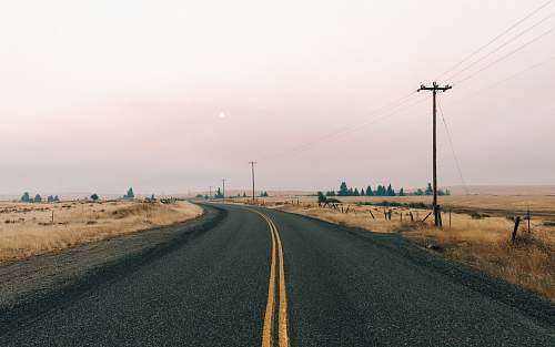 dirt road photo of concrete road gravel
